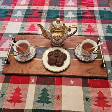 Hand crafted serving/ charcuterie board with epoxy resin river.