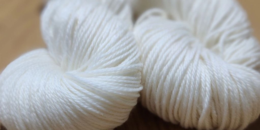 4ply and 8 ply sock yarn shown in 100gms skeins