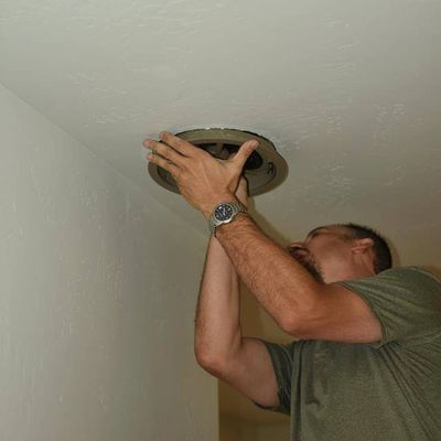 Installing in-ceiling speaker for distributed audio system.