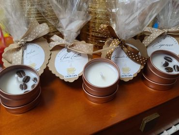 Group of candles of various coffee-inspired scents.