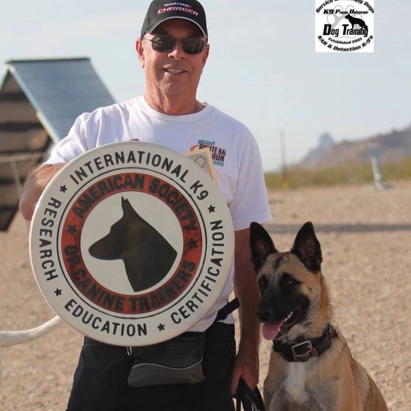 Certified Pet Trainer Mark Naumer teaching Puppy Class in Golden Valley, Kingman, Bullhead City, AZ