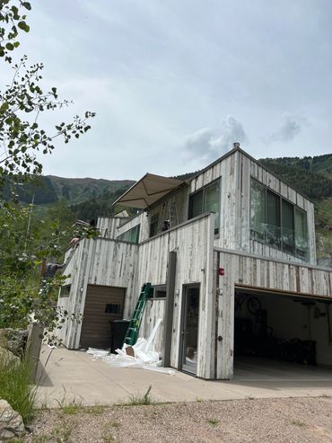 Rustic barn or garage with a canopy