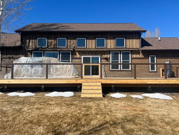 House with wooden deck and balcony