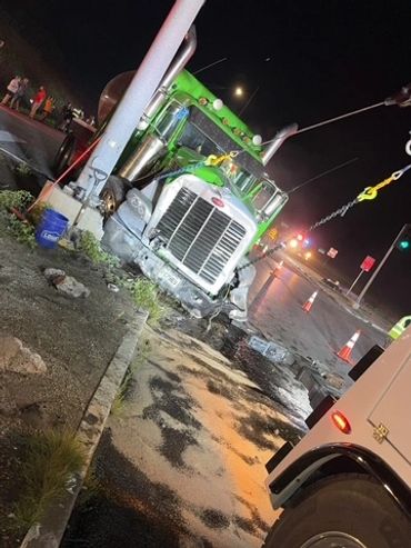 Scott’s Towing handling nighttime semi recovery and accident cleanup near Hannibal, Missouri.