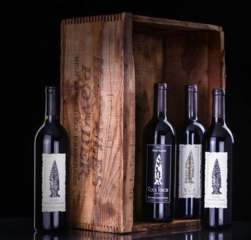 Old box with bottles of wine