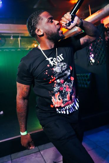 Casanova Red performing one of his hit singles called Sak Pase.