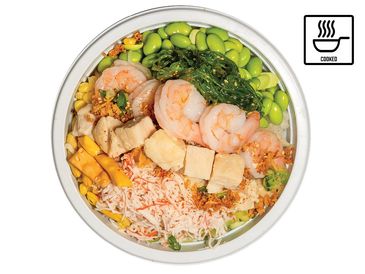 Colorful poke bowl with shrimp, Chicken, and seaweed salad.