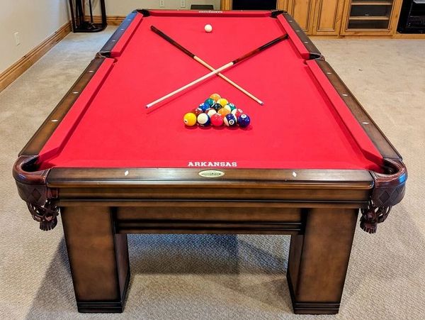 Pool Table with red felt.