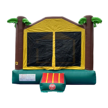 Inflatable bounce house with palm tree design and safety step.
