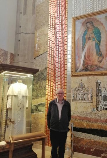 Terry standing next to the bloodstained clothes of John Paul II.