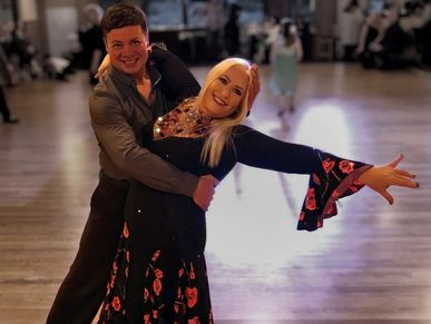 Dancing couple demonstrating ballroom latin swing country dance patterns taught by Arlen & Keith