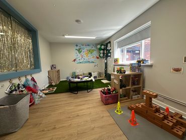 Dress up station, construction zone, animals and exploring nature area.