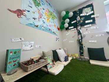 Nature room reading and exploration corner. Big beanstalk on the wall and world map