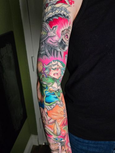 Colorful tattoo sleeve featuring anime and fantasy characters on a man's arm.