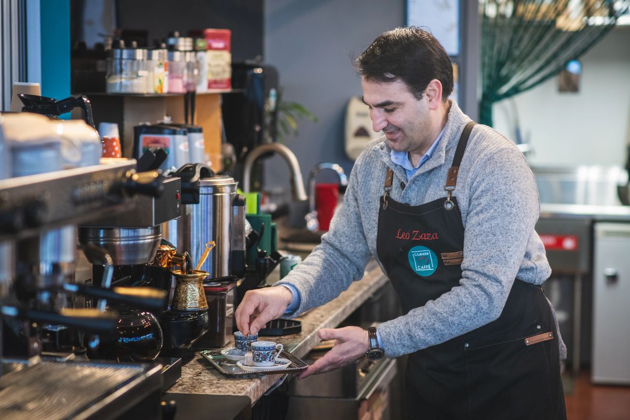 Leo Zaza prepares traditional Turkish coffee at his Anacortes Washington Corner Caffe location.