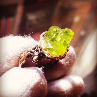 Handmade jewelry workshop in Barcelona featuring natural raw-cut gemstones and 925 silver.