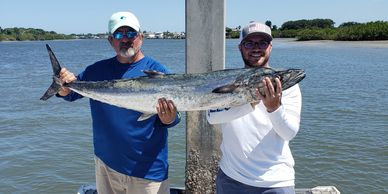Big kingfish caught on a deep sea fishing charter in daytona beach