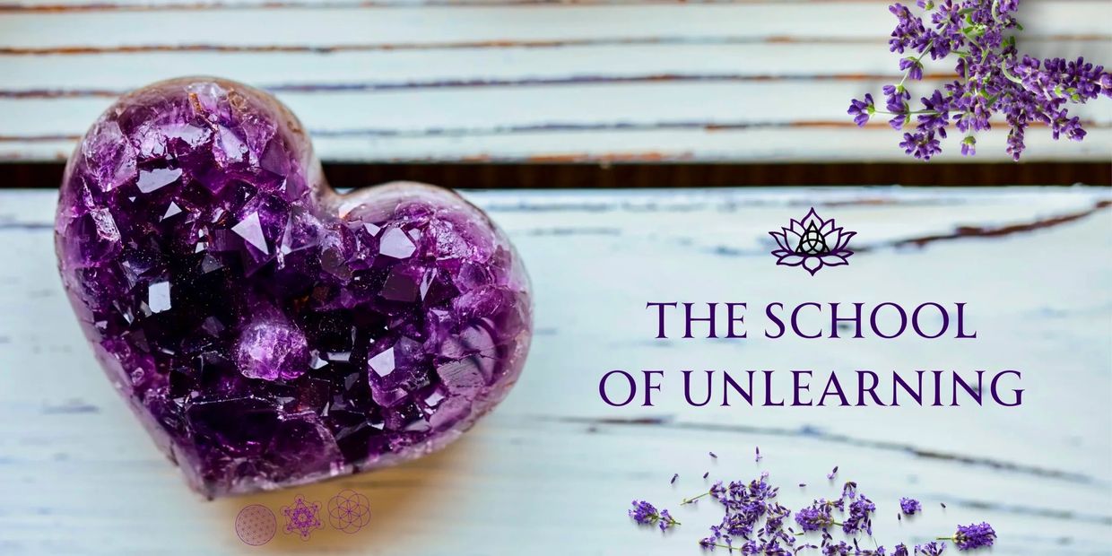 Purple crystal heart with lavender and text 'The School of Unlearning'.