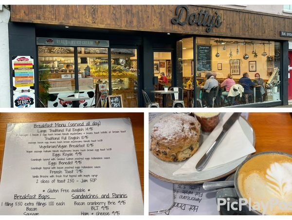 Dotty’s cafe in Looe with menu and coffee and scone