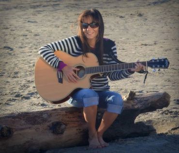 Guitar in my hands and my toes in the sand ~ My happy place!