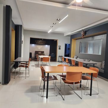 Community coworking space with tables and chairs