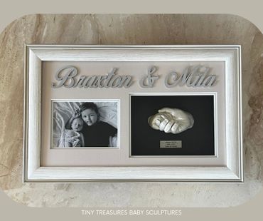 Sibling frame - Hand casts with small names.