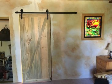 Custom made barn door made with Colorado beetle kill pine