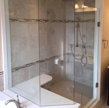 Design your own custom frameless shower with seating, nooks, shelving and more