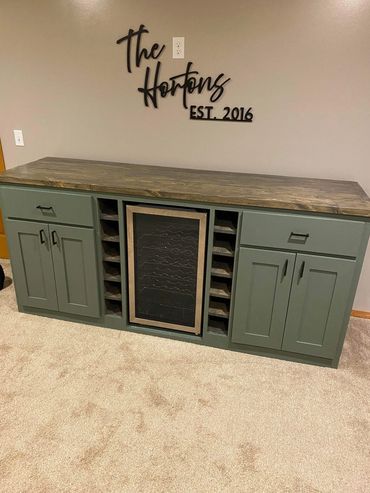 Custom wine fridge bar for basement with space for wine and other bar necessities, built by Henry's.