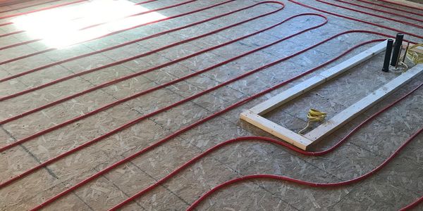 in floor heating, plumbing, new construction, red floor piping