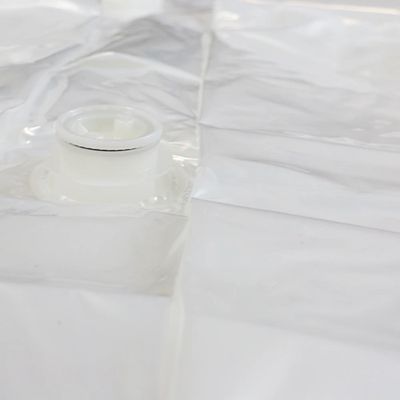 Close-up of a transparent plastic bag with a white valve.