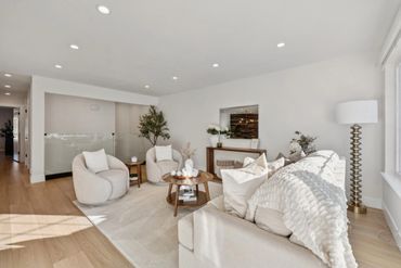 Bright, cozy living room with beige tones and modern decor.