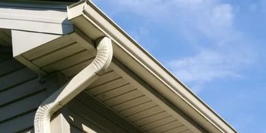 Our roofing company installs siding and gutters