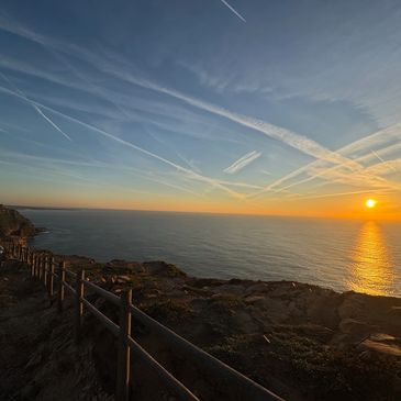 Picture of a sunset over the ocean in Portugal.