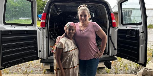 Ahzea Makhubu with Saba Teklemarcos at Agape Mobility Ethiopia U.S. headquarters in Fort Wayne, Ind.