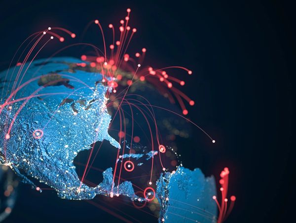 Digital map showing global data connections with red network lines.