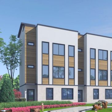 Modern townhouse with large windows and wood panel accents.