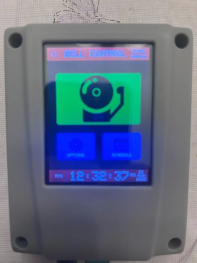 Digital bell control panel with time display.