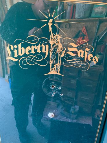 A Liberty Safe that is drilled open.