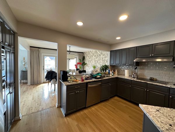 Dark kitchen that was separated from the dining room