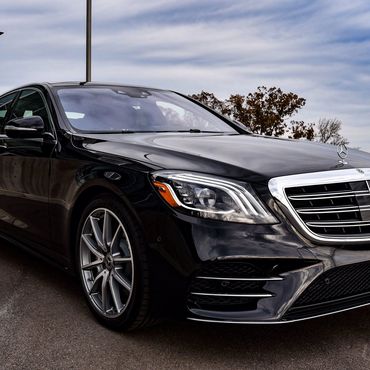 2020 Mercedes S550 sedan for upscale limo service, black with leather interior, embodying luxury.