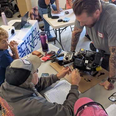 women working on engines
