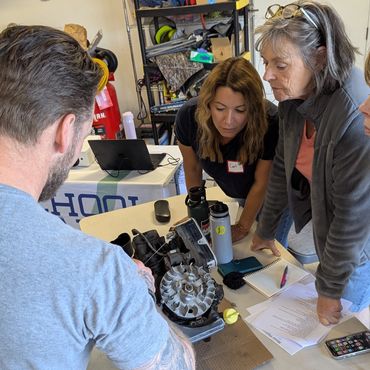 women working on engines
