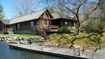 A cabin and house on multiple acres in far western New Jersey near the Delaware River