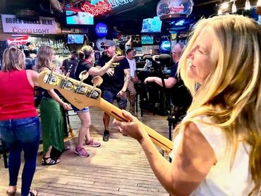 Christina with bass and a fun crowd