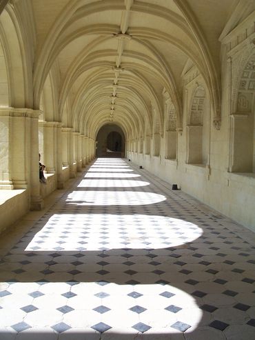 "Abbey Walkway." Arches and curves and diamonds at an abbey in the Loire Valley, France.