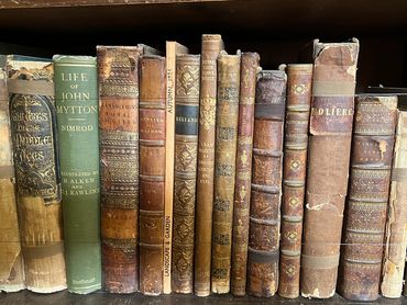 A shelf of old books in Lacock Abbey, where many films such as Harry Potter movies, were filmed.