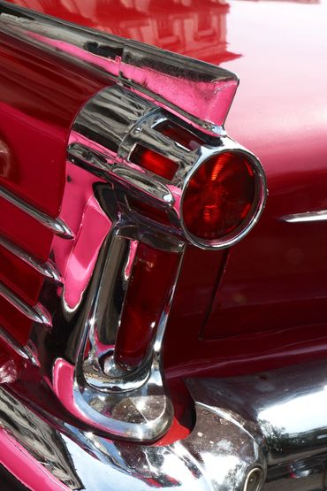 "Red Tail Light."  The old US cars are kept in pristine condition (on the outside) for tourists.