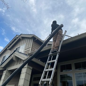 Cleaning second story gutters with our gutter provac in Wilsonville oregon