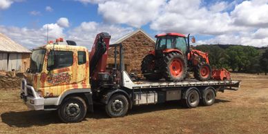 Rusty Nuts Towing & Hiab floating a tractor